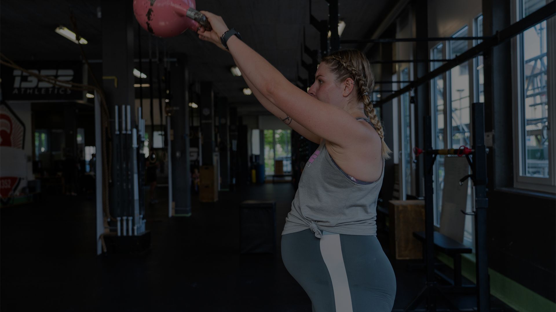 Pregnant woman doing kettlebell training
