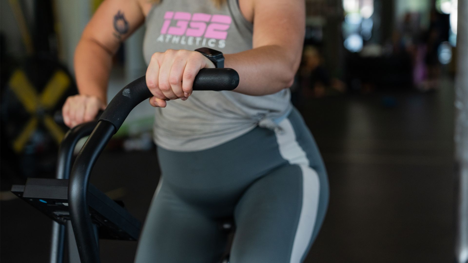 Woman training on the ski ergometer in the 1352 Athletics hall